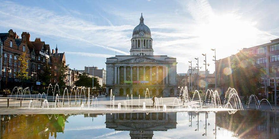 Image of the Nottingham City Council building in front of a pond with fountains